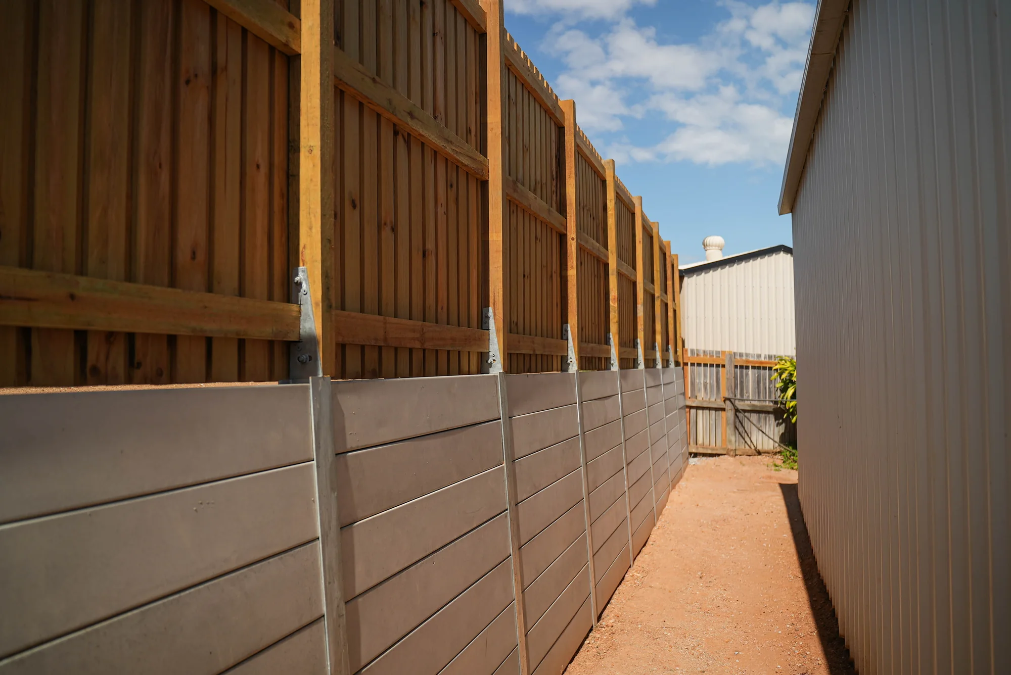 Sleeper & Block Retaining Walls project by CQ Property Solutions