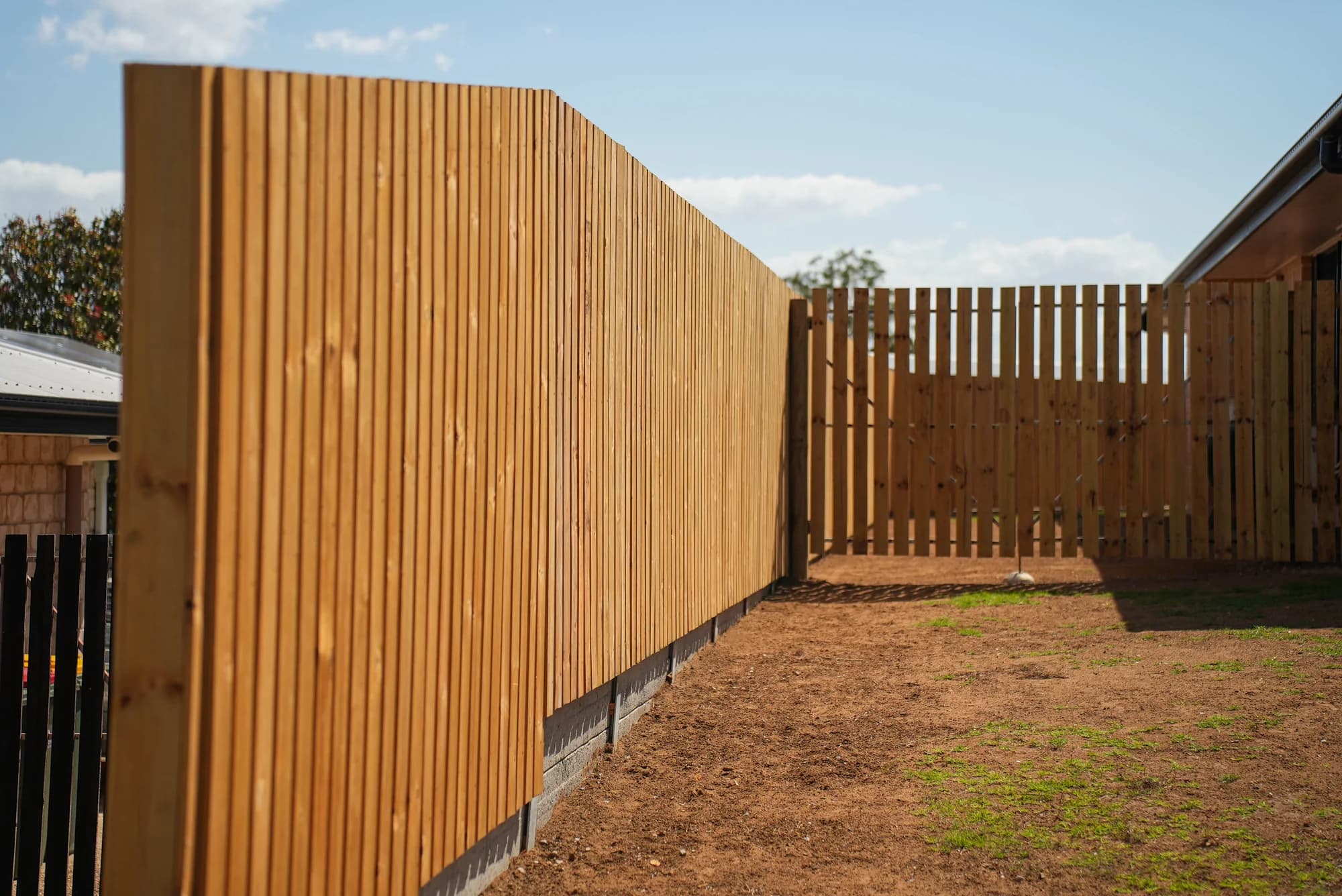 Timber paling fence and matching pedestrian gate