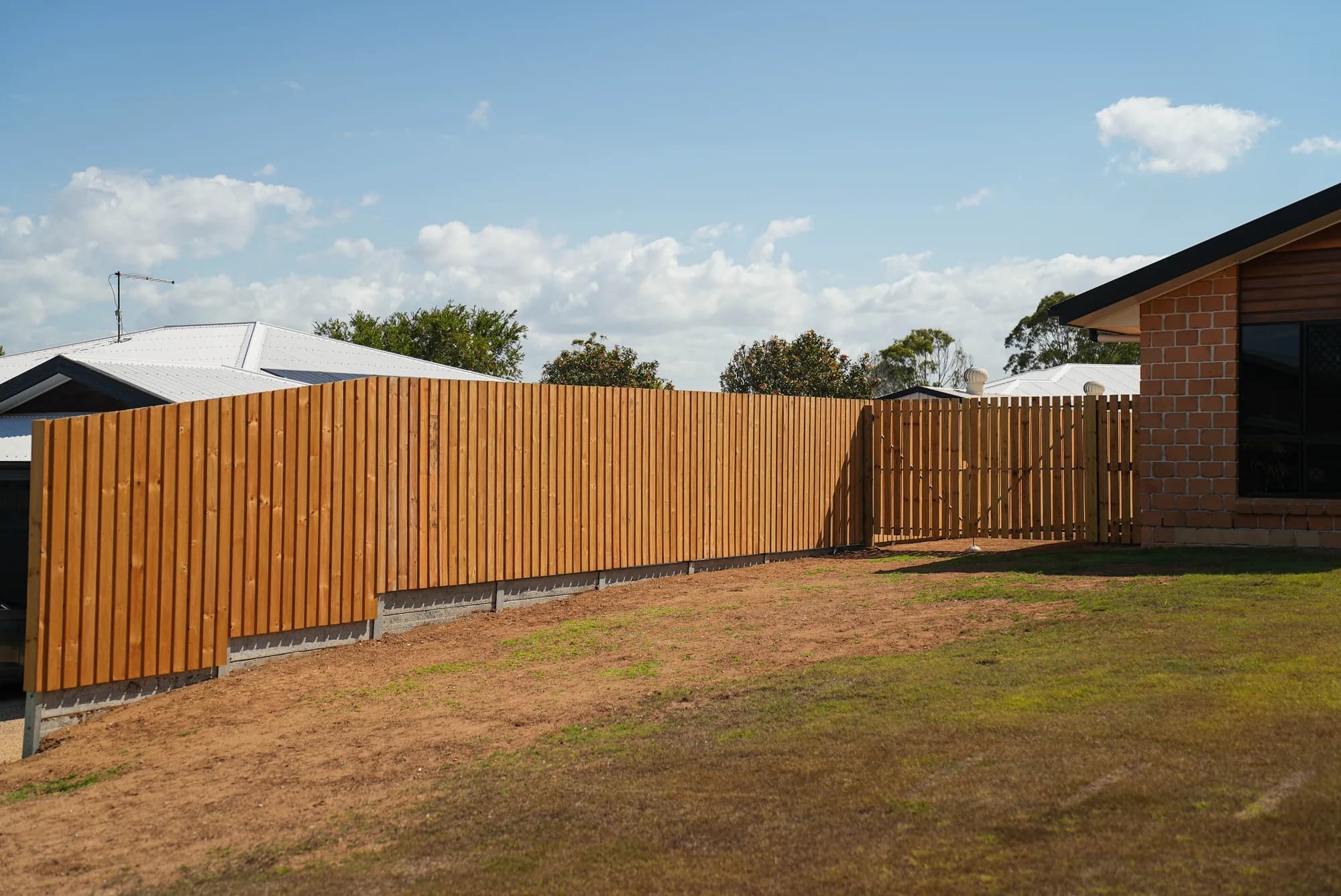 Wide view of a finished timber backyard fence